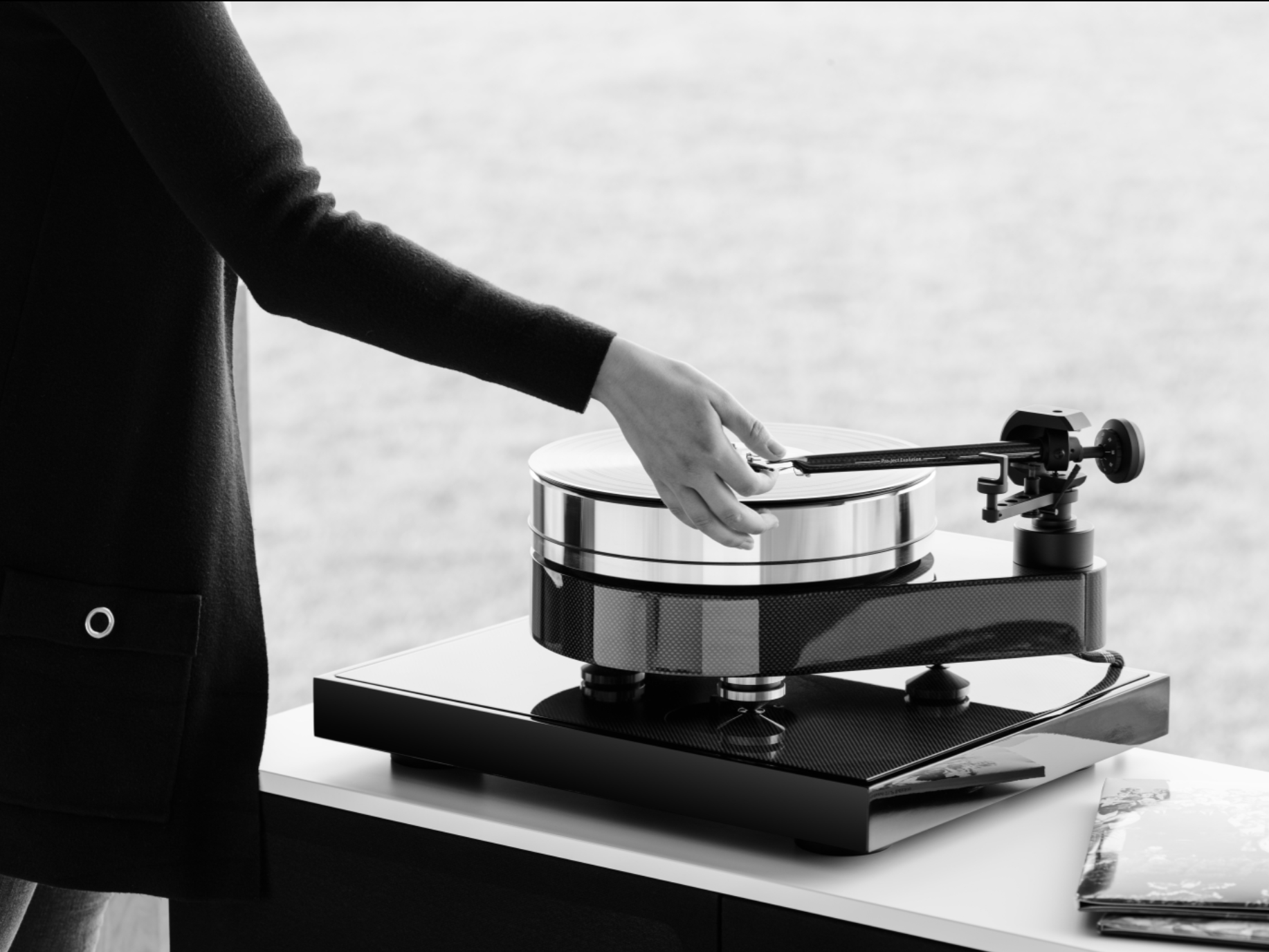 ProJect RPM 10 Carbon Turntable with Ground It Carbon Isolation Base. lifestyle image
