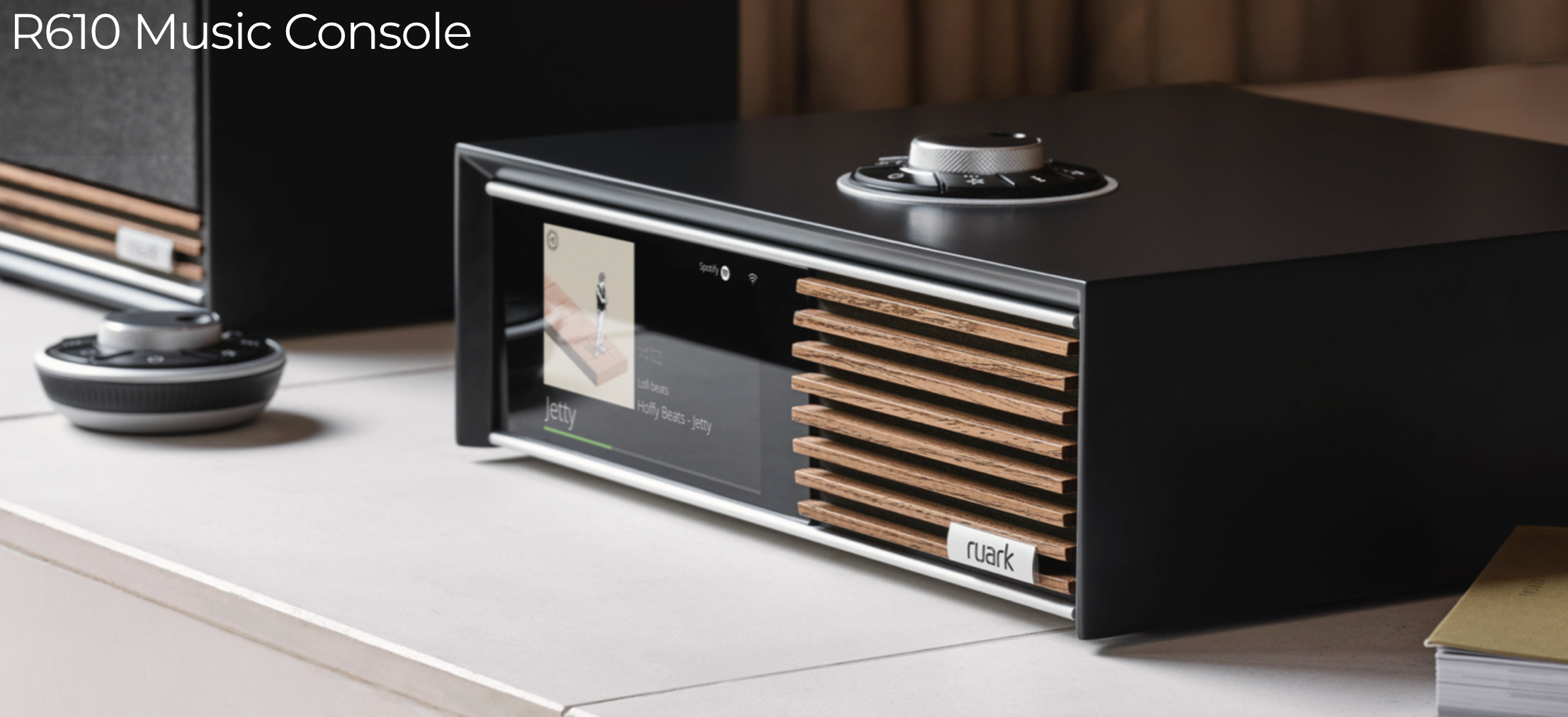Ruark Audio R610 Music Console in Satin Charcoal Lacquer with Walnut Slat Trim, in room view