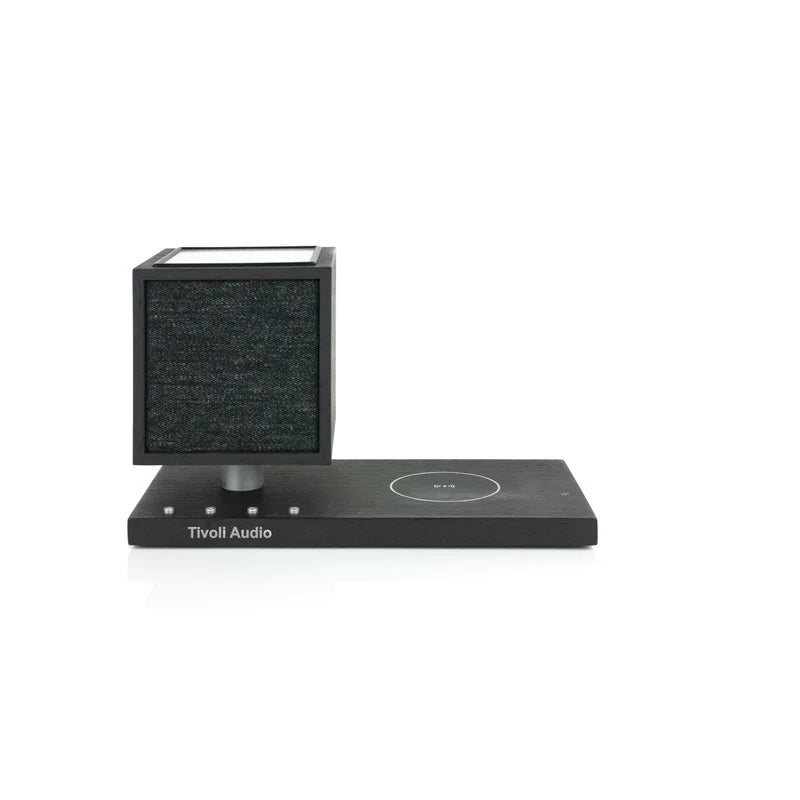 The Tivoli Audio Revive compact speaker delivers powerful sound while recharging your devices wirelessly. Black image
