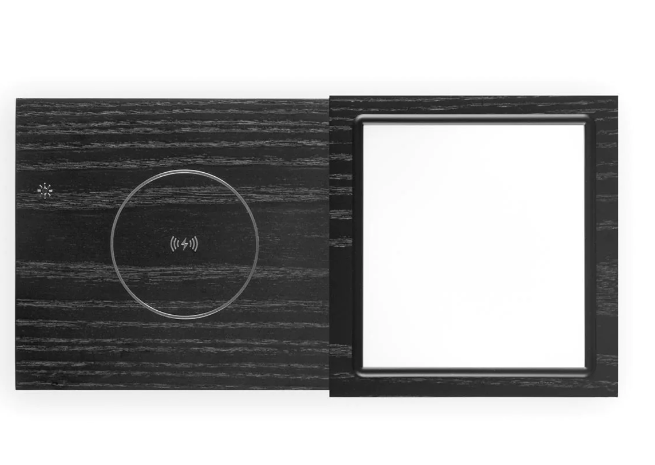 The Tivoli Audio Revive compact speaker delivers powerful sound while recharging your devices wirelessly. Black top image