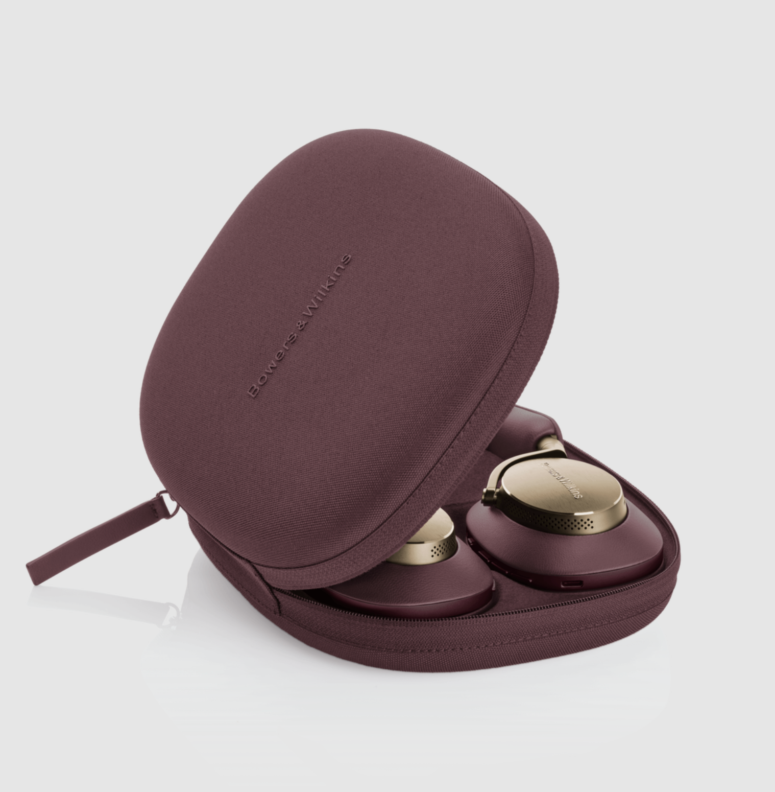 B&W Px8 Noise Cancelling Headphones in Royal Burgundy. Image of case