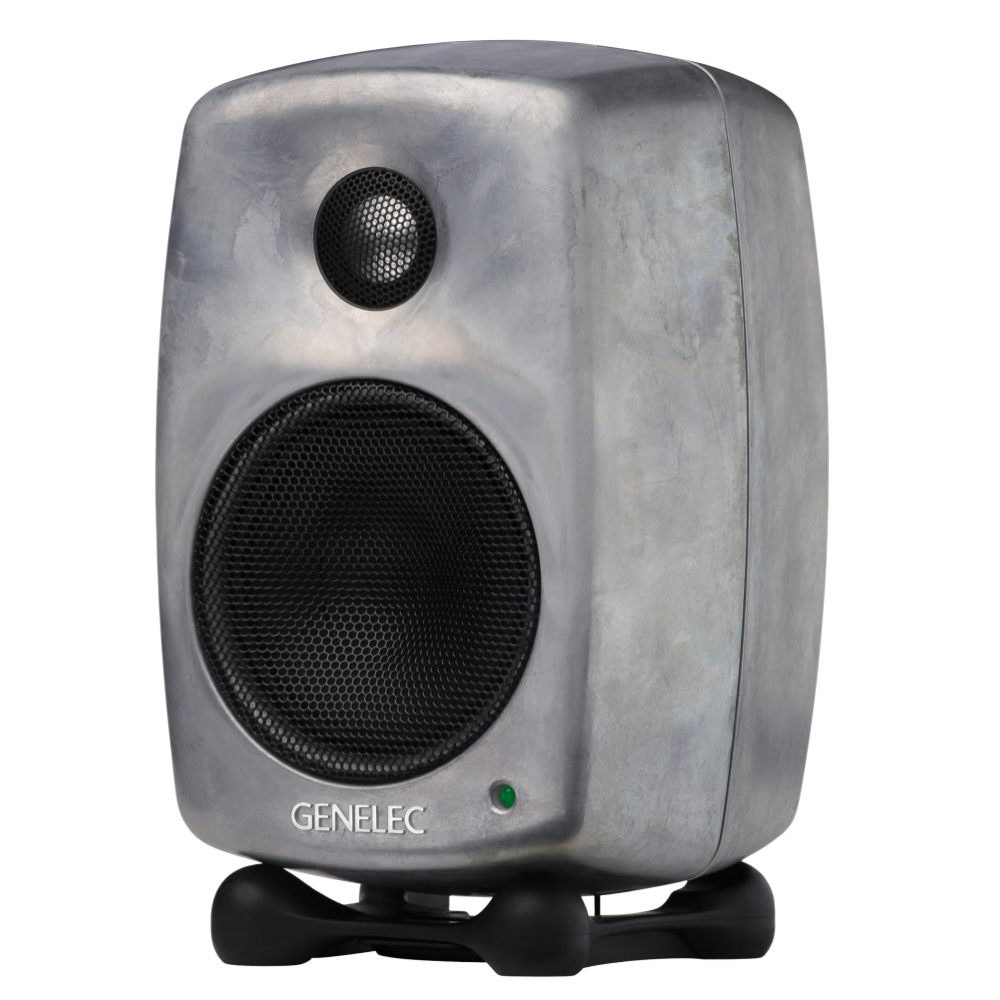 Genelec 8010A Active Studio Monitors.  Individual monitor shown in Raw, angled to the left