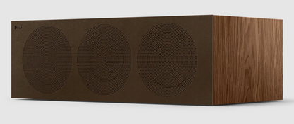 KEF R6 Meta Centre Channel Speaker in Walnut. Front on an angle with grille.