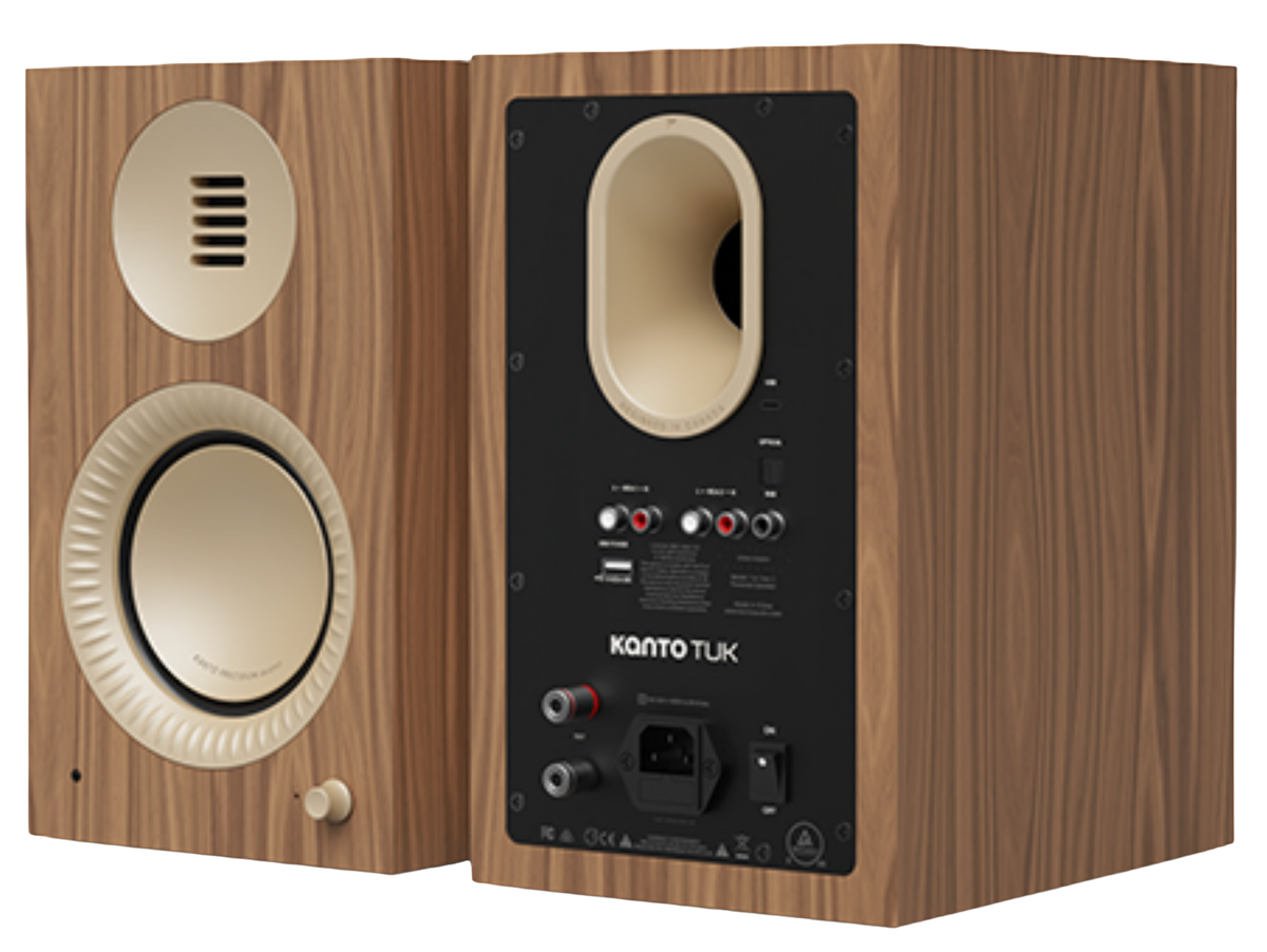 Kanto Audio TUK 2nd Generation 260W Active Speakers in Matte Walnut with Rose Gold, angled front and back of Active Speaker