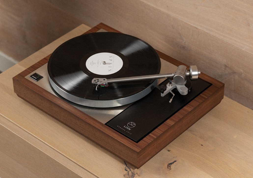 Linn Turntable with a vinyl record on a wooden surface
