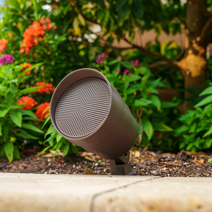 Outdoor Garden 4.1 Volt Ohm Speaker System Powered by the WiiM Amplifier, speaker in garden