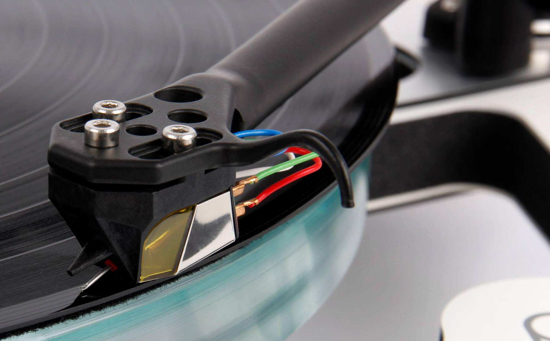 Rega Nd7 Neodymium MM Cartridge, shown mounted on vinyl