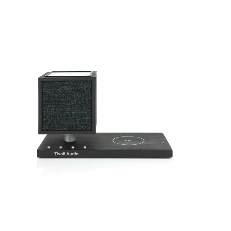 The Tivoli Audio Revive compact speaker delivers powerful sound while recharging your devices wirelessly. Black image 