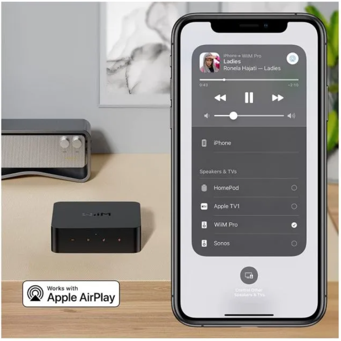 WiiM Pro Plus Wireless Audio Streamer Airplay 2 & Chromecast.  Image shows mobile phone and app