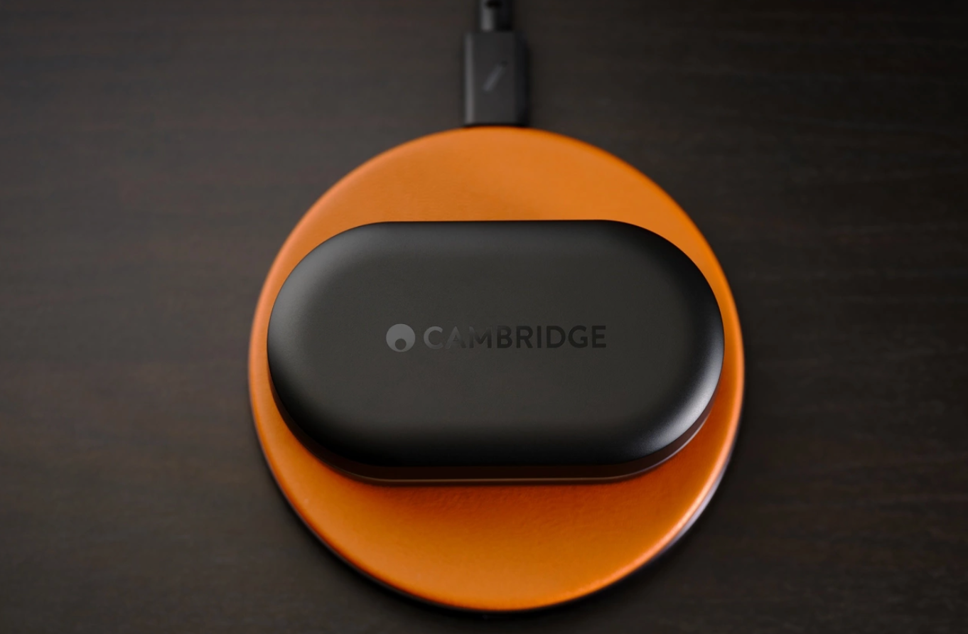 Cambridge Audio Melomania M100 True Wireless Headphones on charging pad