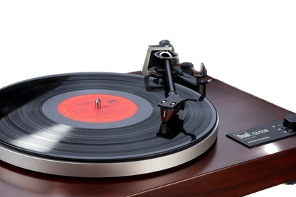 Dual CS-518 Manual Turntable in Walnut with record playing