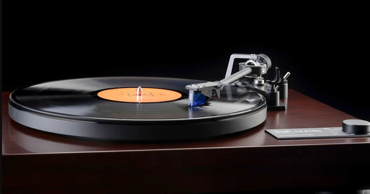 Dual CS-618Q Semi-Automatic Turntable in Walnut with vinyl playing