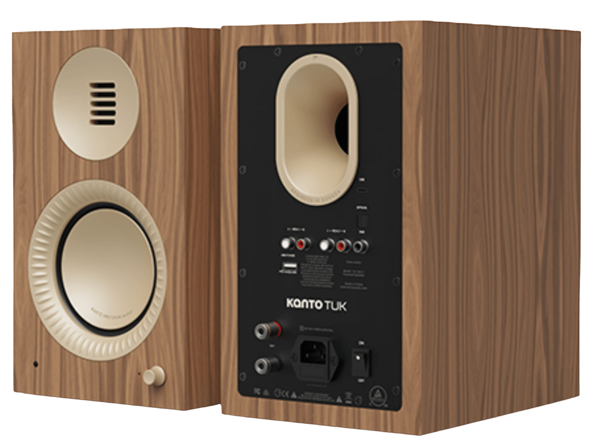 Kanto Audio TUK 2nd Generation 260W Active Speakers in Matte Walnut with Rose Gold, angled front and back of Active Speaker
