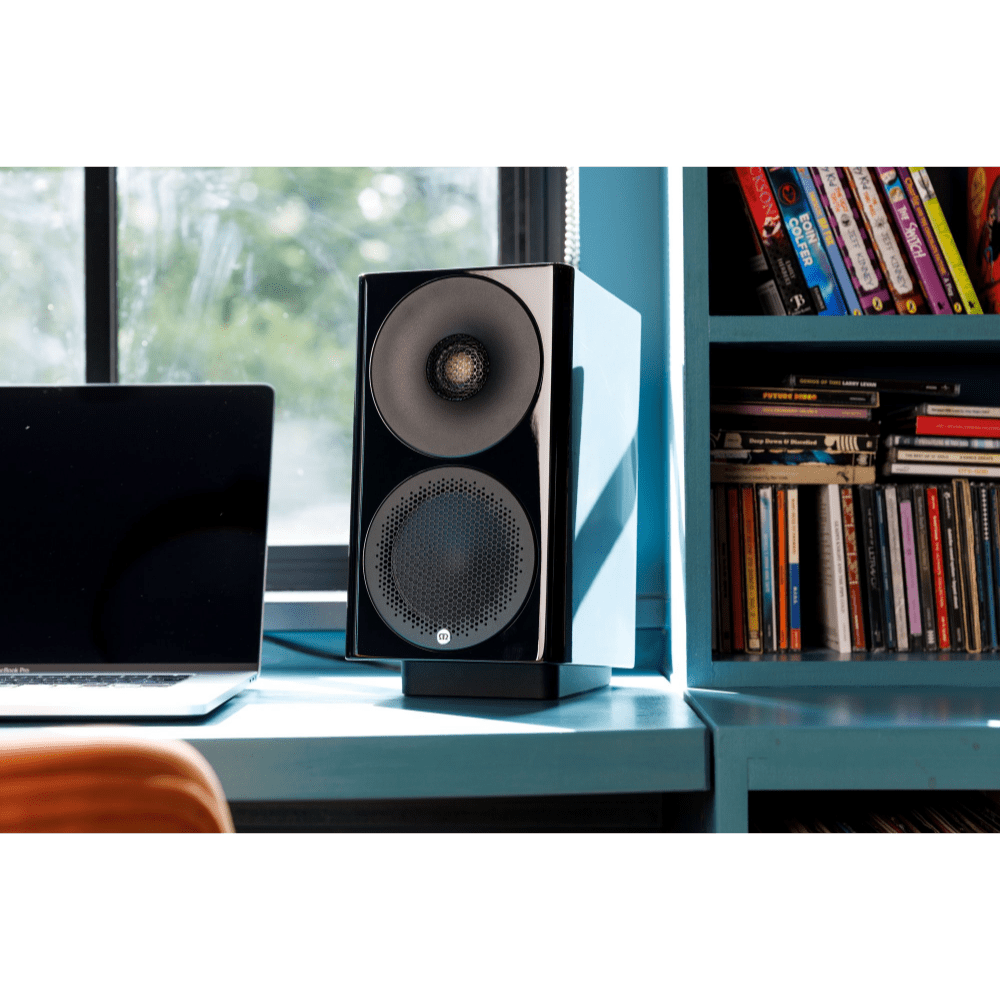 Monitor Audio Radius Desk Pad 4G Isolation Platform shown with Monitor Audio Radius 3 4G Speaker in Gloss Black on desk