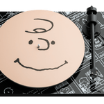 ProJect Peanuts Turntable with Ortofon OM 10 Cartridge with special Charlie Brown acrylic record plate placed on top of the glass main platter.