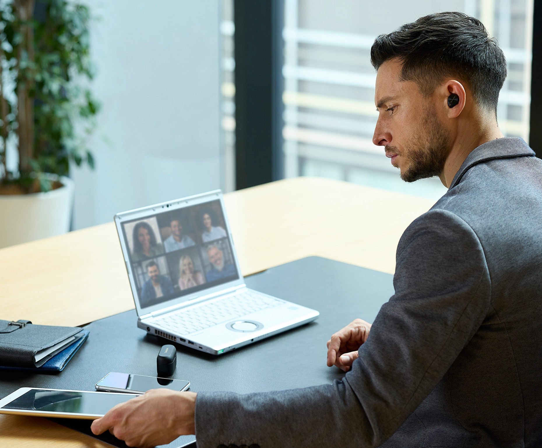 Technics EAH-AZ80 Noise Cancelling Earbuds, in office image