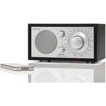 The iconic Model One BT radio delivers timeless style and exceptional sound, with Bluetooth connectivity. Black/Sliver image with phone