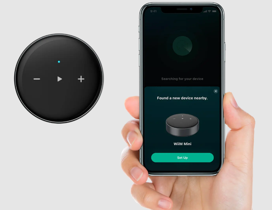 WiiM Mini Hi-Res Wireless Audio Streamer. Image with mobile phone and app